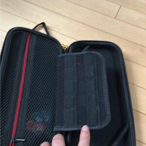 Black Travel Organizer with Red Accent